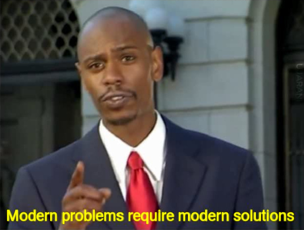 Dave Chappelle pointing his finger at the viewer, with the meme in yellow letters captioned below.