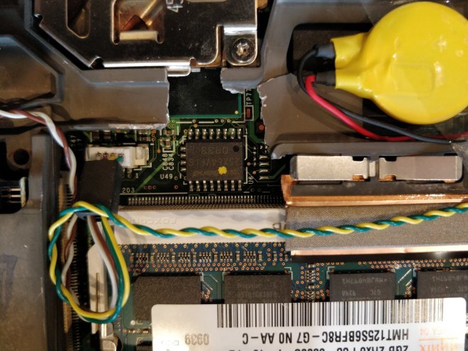 Hole cut in T500 frame to expose SOIC chip